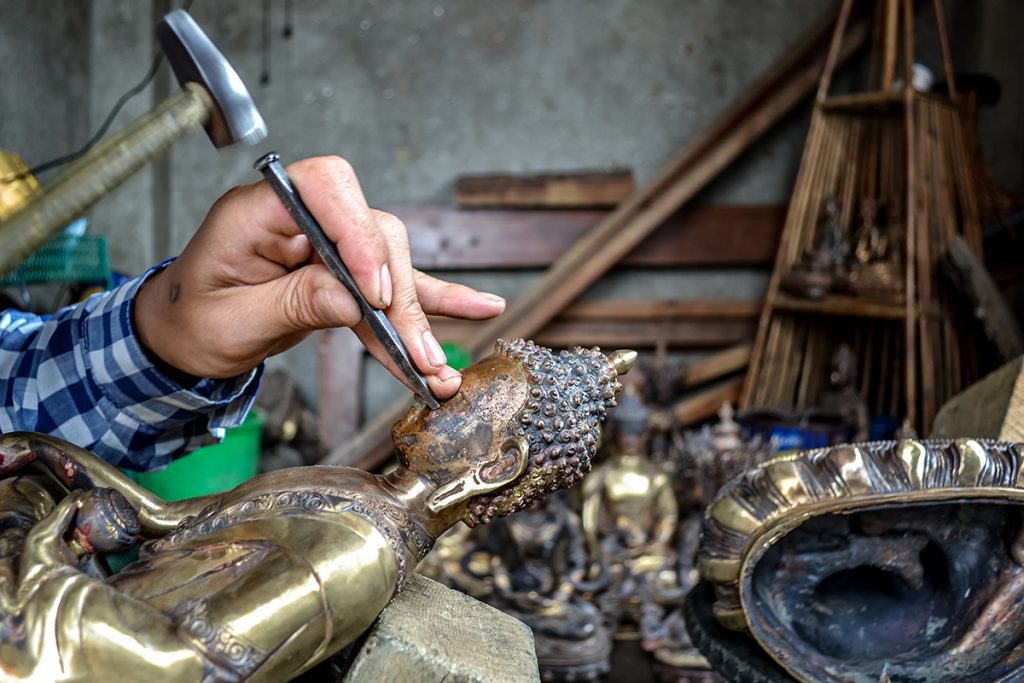 One of the oldest and most widespread methods of making metal statues in Nepal is that of lost wax casting. This method is said to have been passed on by the Shakya clan, who learned it during trading trips to Tibet.